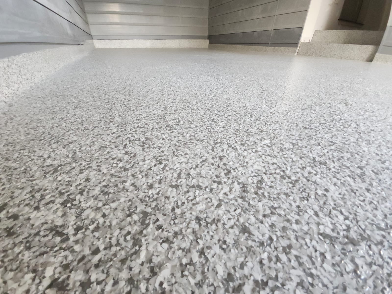 Protecting Your Garage Floor and Driveway This Winter: Safety, Salt, and Smart Solutions